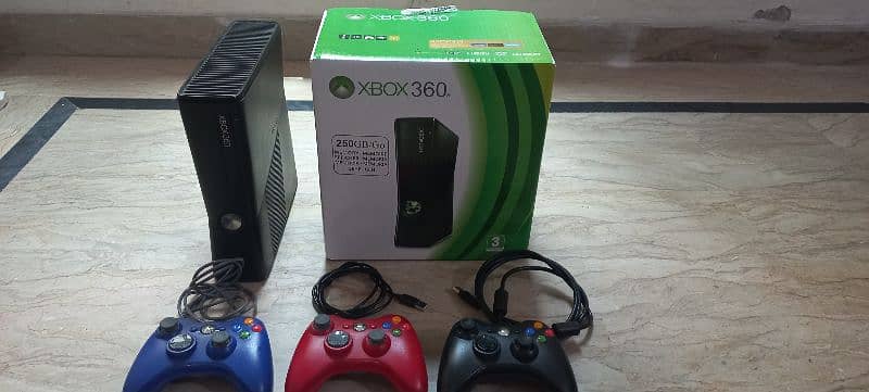 xbox 360 with games and 3 coloured controler just 1 month used 6