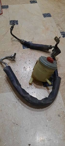 suzuki Liana power steering bottle with pipe 2