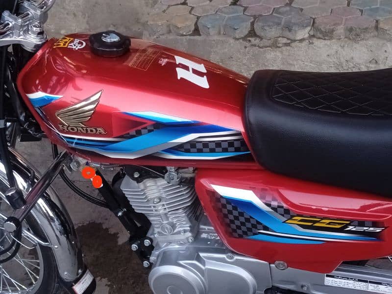 Honda 125 24 model 23 ke last month ka Num+2way security system instal 1