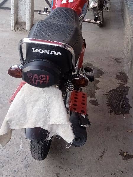 Honda 125 24 model 23 ke last month ka Num+2way security system instal 2