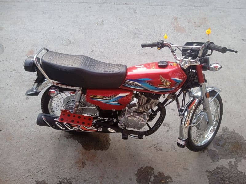 Honda 125 24 model 23 ke last month ka Num+2way security system instal 9