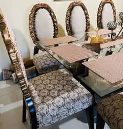 8 seater designer dining table / 8 chairs / wooden /glass top