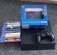 PS4 Pro 1TB with 1 controller,  1 Fighting /joy stick and 9 Games