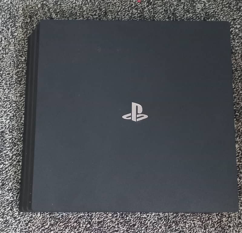 PS4 Pro 1TB with 1 controller,  1 Fighting /joy stick and 9 Games 1