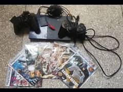 ps2 slim with 2 controllers and 7 games with all accessories