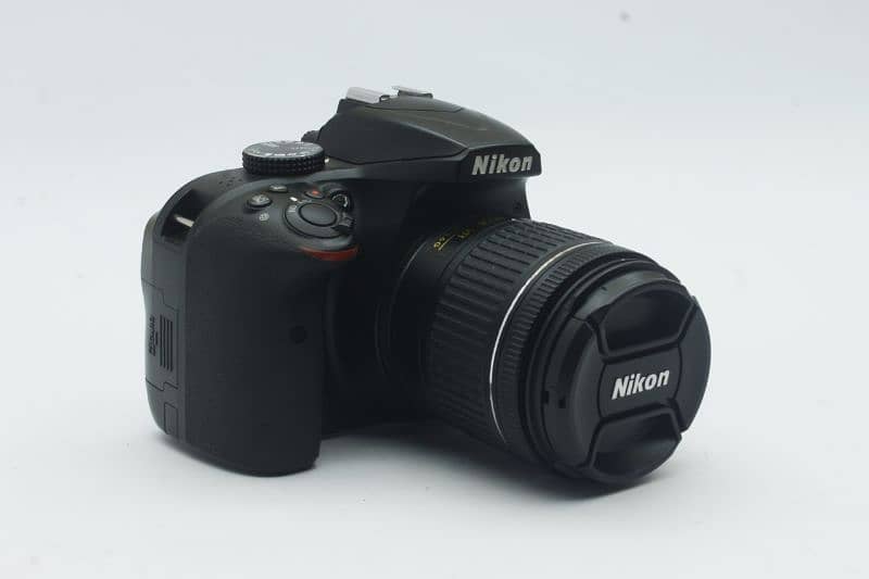 Nikon D3400 with  lens 18-55mm 1