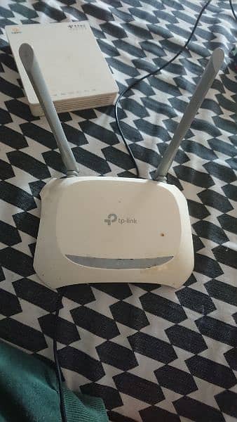 Tp-Link Wifi Router or GPON Punio fiber converter 1
