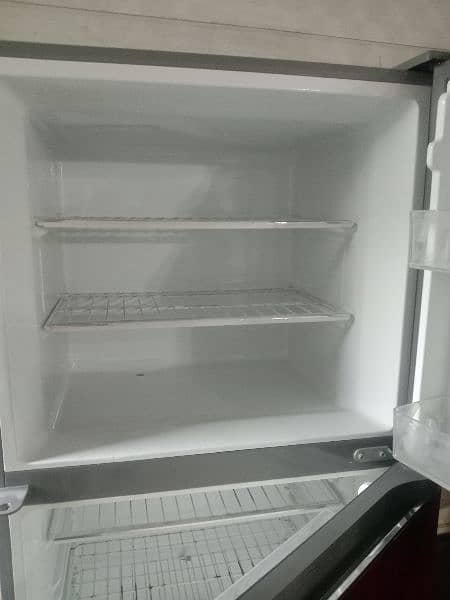 Almost new fridge good condition 2