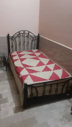 single iron bed