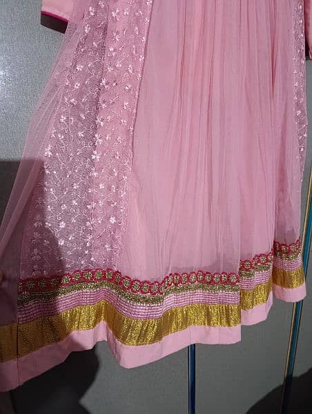 Baby pink frok with frill and belt to adjust size 2