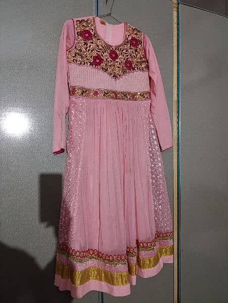 Baby pink frok with frill and belt to adjust size 6