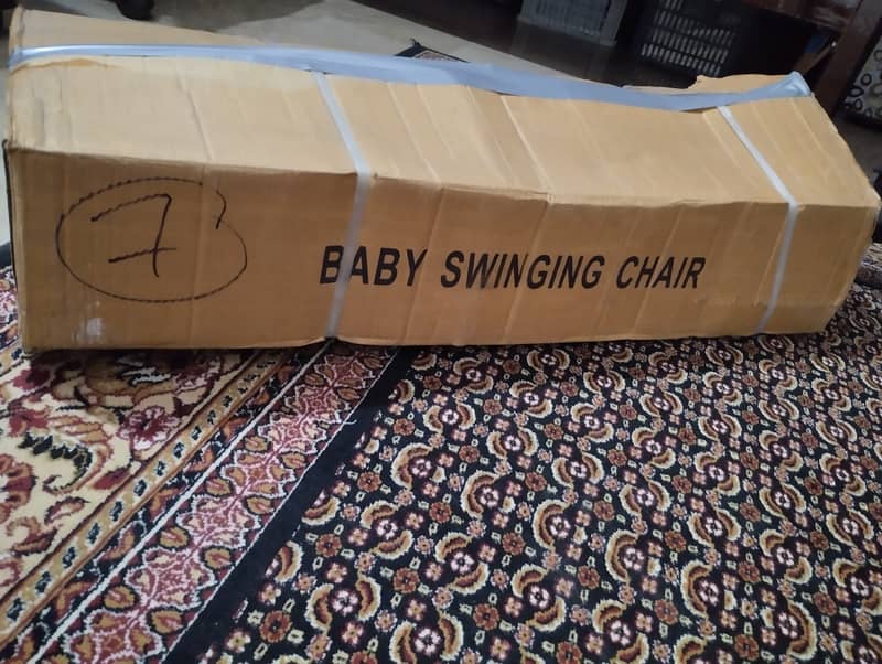 Baby swinging chair 1