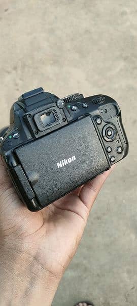 Nikon D5100 with 18_200mm lenz 1