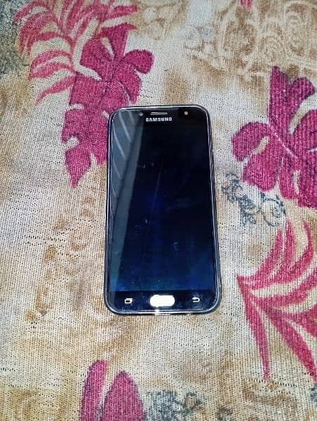 samsung galaxy j7 3 /32 condition 8/10. . . 0