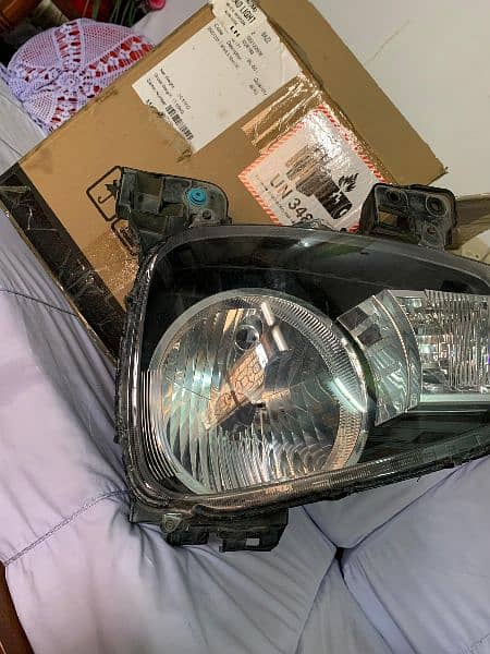 Alto headlight ( left ) 5