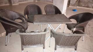 set of five tables and chairs 0
