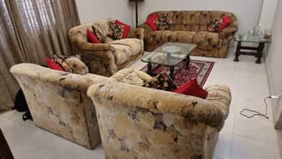 Slighty used 7 seater sofa with 3 tables