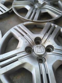 HONDA CITY GENUINE WHEEL CUPS FOR URGENT SALE IN 10/9 Condition.
