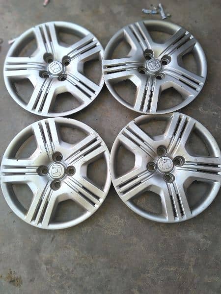 HONDA CITY GENUINE WHEEL CUPS FOR URGENT SALE IN 10/9 Condition. 2