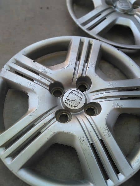 HONDA CITY GENUINE WHEEL CUPS FOR URGENT SALE IN 10/9 Condition. 3