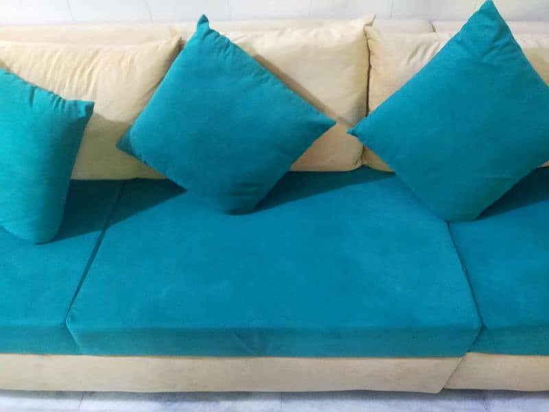 Aesthetic sea green and skin coloured L shape sofa. 2