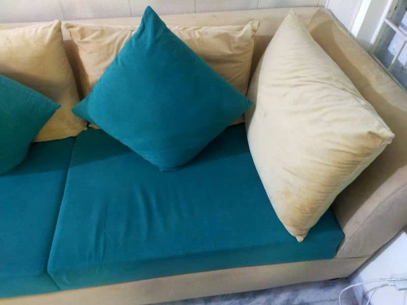 Aesthetic sea green and skin coloured L shape sofa. 4