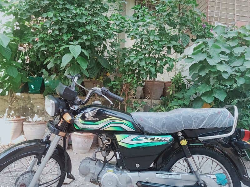 Selling My HONDA CD70 in Nut to Nut Genuine Condition Karachi register 3