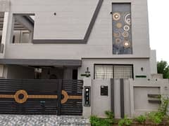 8 Marla brand new ful furnished designer house for sale E block behria orchard low price 0