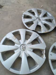 TOYOTA COROLLA GENUINE WHEEL CUP IN 10/7CONDITION FOR URGENT SALE.