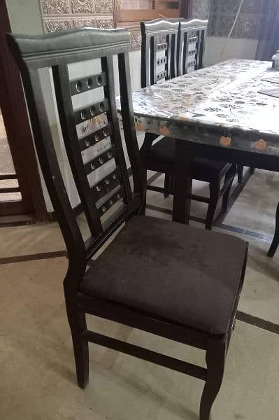 glass top 6 chairs dinning table 1