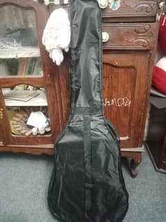 Acoustic guitar for sale with free bag, strings, and picks