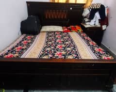 bed with dressing table and more