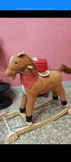 rocking horse 2 in 1 with moving tale condition 10/9