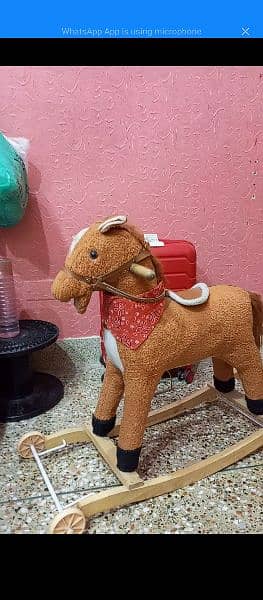 rocking horse 2 in 1 with moving tale condition 10/9 1