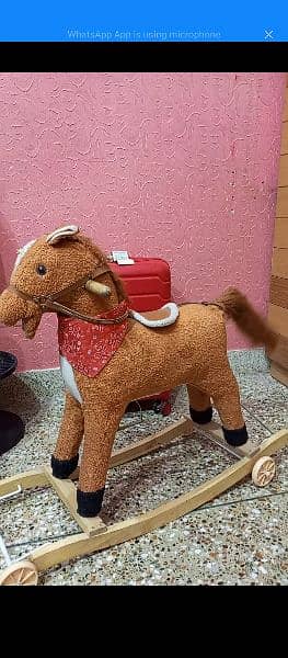 rocking horse 2 in 1 with moving tale condition 10/9 2