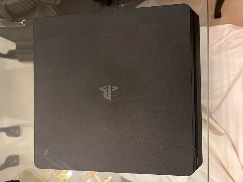 PlayStation 4 in good condition with box including travelling bag 3