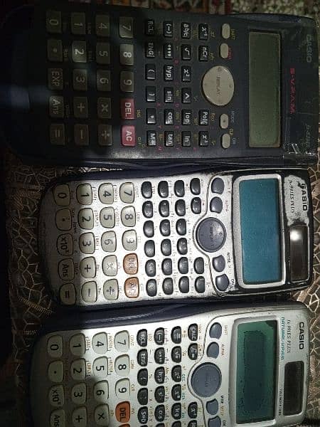 3 Calculators for Sale Detail in Description 1