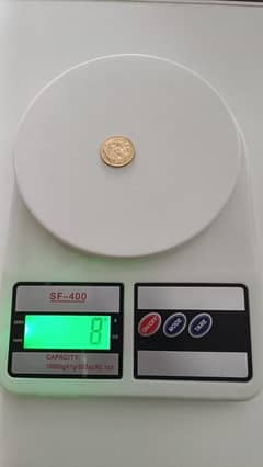 an 8 gram gold coin