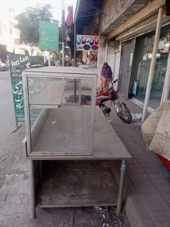 Display counter for milk shop with small cash counter