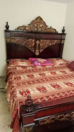 bed with side table dressing and pot almari
