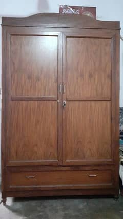 I sell my Wooden almari. . cabinet. . drawers