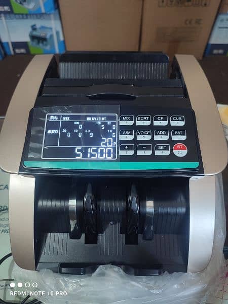 Cash currency note counting machine with note detection packet counter 12