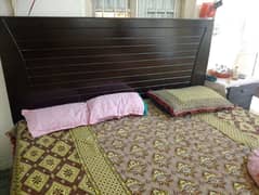 double bed with two mattress and singer maze
