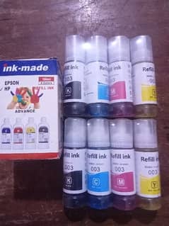 hp and epson ink bottles