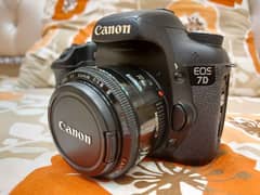 Dslr  Canon 7d body with 50 mm lens