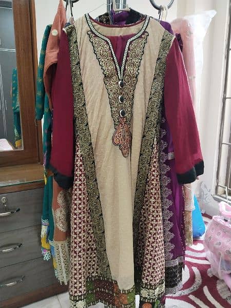 party wear long frock new condition in large size only buy and wear 2