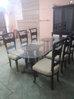 8 seater glass top wooden dining table with 6 wooden chairs