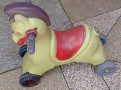 Plastic Horse Toy Four Wheels for Kids Playing in Good Condition