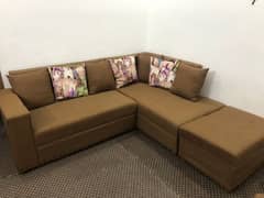 L shape sofa with small paffie and one dewan