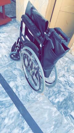 Wheelchair with brakes installed